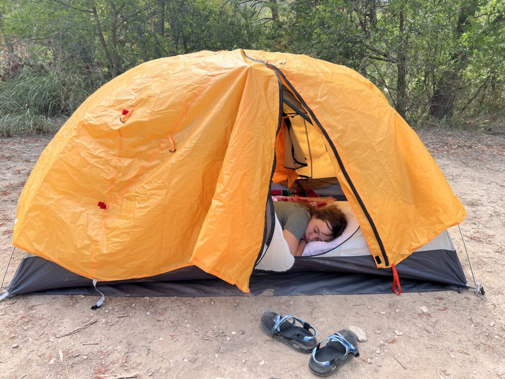 Sarah Seymour sleeping in Trailmade Tent from REI, Best Rated Reviews